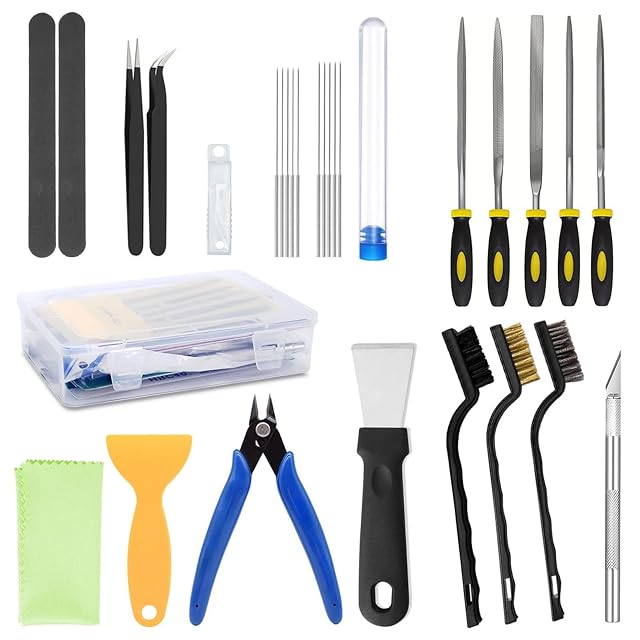 Juego extendido: lijas de barra, pinzas, agujas en un tubo, cinco limas, una caja transparente, paño, rasquetas de plástico y acero, alicate de corte, cepillos y un cúter de manualidades