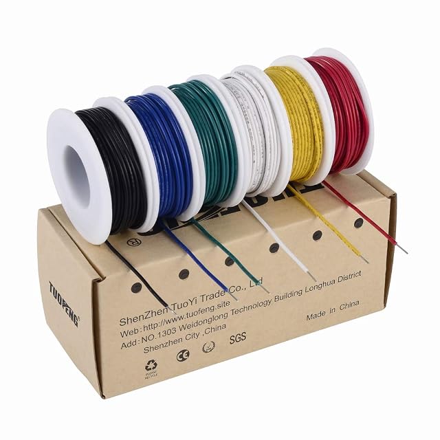 Seis bobinas de cable negro, azul, verde, blanco, amarillo y rojo sobre una caja de TUOFENG