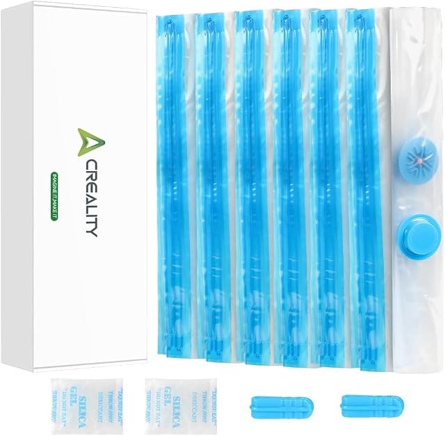 Caja de Creality junto a bolsas plegadas con cremallera azul, una válvula redonda con tapón, dos sobres de gel de sílice y dos deslizadores de cremallera azules