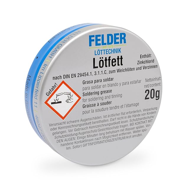 Lata FELDER Lötfett de 20 g con un pictograma de peligro corrosivo, la palabra Gefahr y una línea sobre el contenido de cloruro de zinc