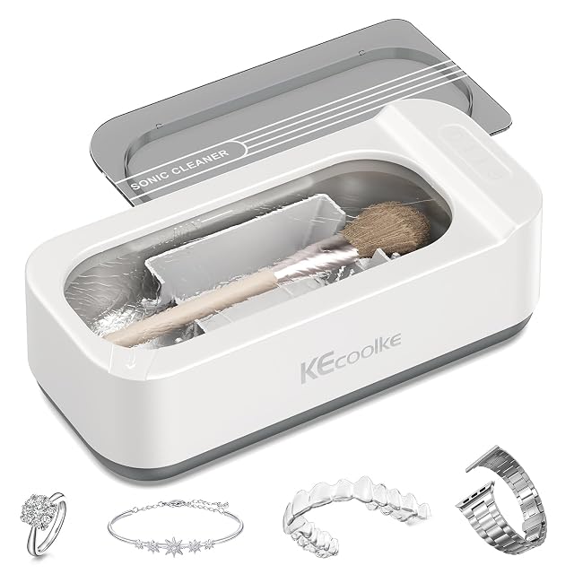 Limpiador ultrasónico compacto blanco KECOOLKE SU-707A con su tapa gris levantada